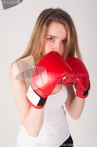 Image of Pretty girl with boxing gloves