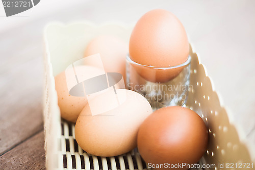 Image of Chicken eggs in a basket