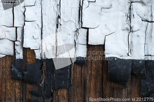 Image of Old cracked paint on boards