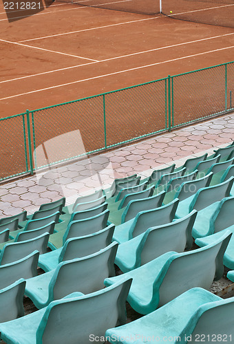 Image of Grandstand seats and tennis court