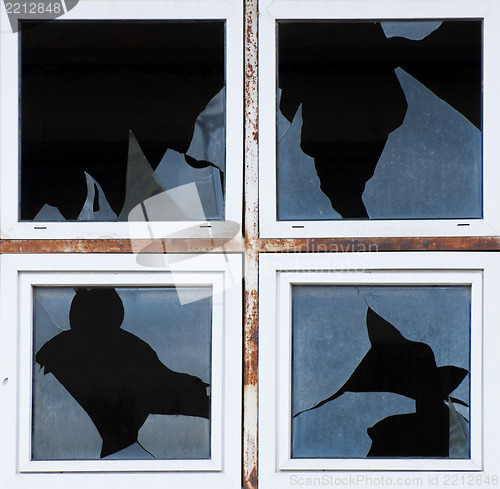 Image of Broken windows of old building