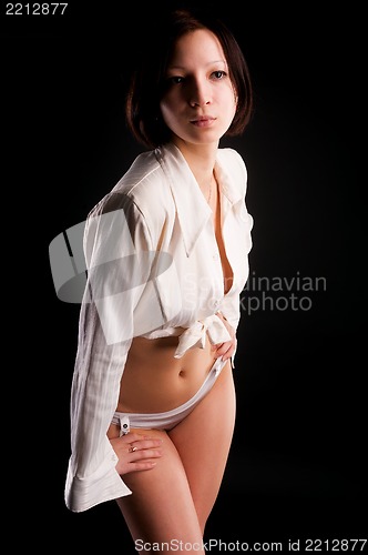 Image of young sexy woman in white shirt