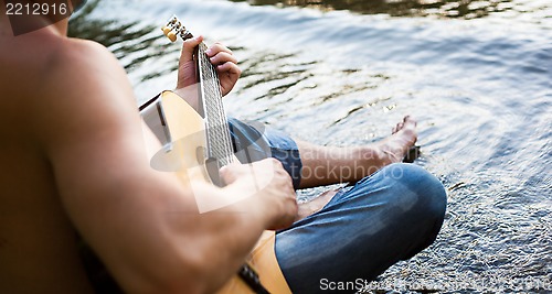 Image of Man and guitar