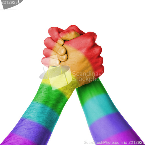 Image of Man and woman in arm wrestlin, rainbow flag pattern