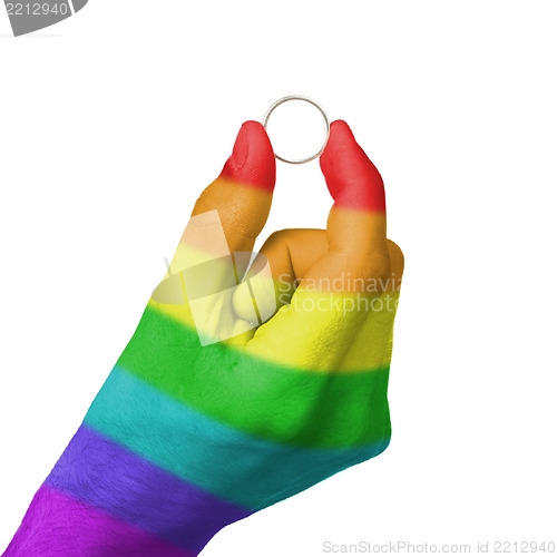 Image of Gay man holding ring