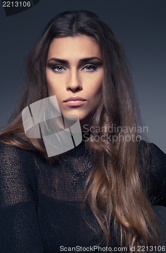 Image of beautiful woman in black dress