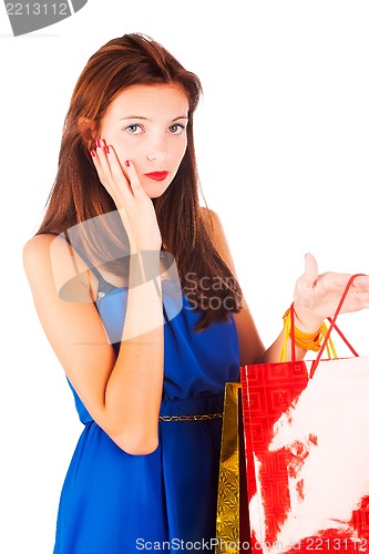 Image of Attractive woman holding bags