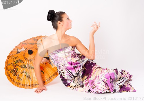 Image of Attractive girl with umbrella