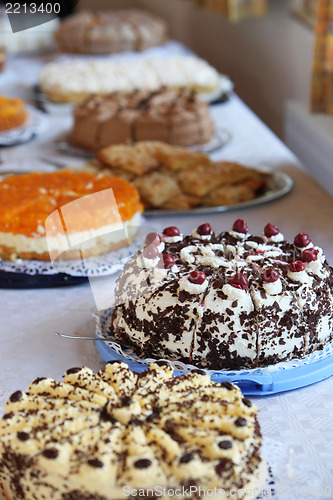 Image of Buffet table with an assortment of cakes