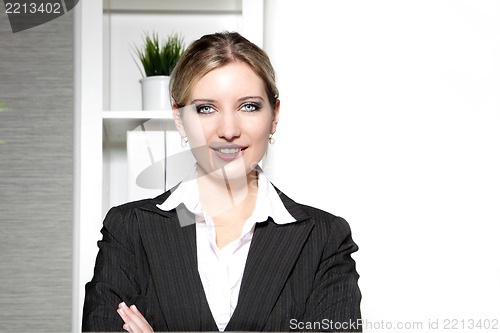 Image of Smiling confident professional woman