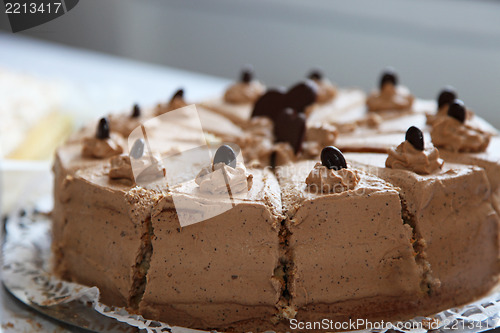 Image of Creamy tasty chocolate birthday cake, close-up