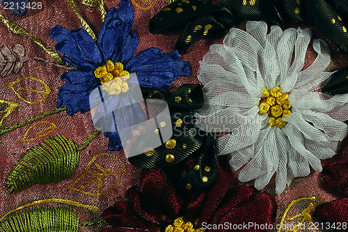 Image of Flowers embroidered by tapes