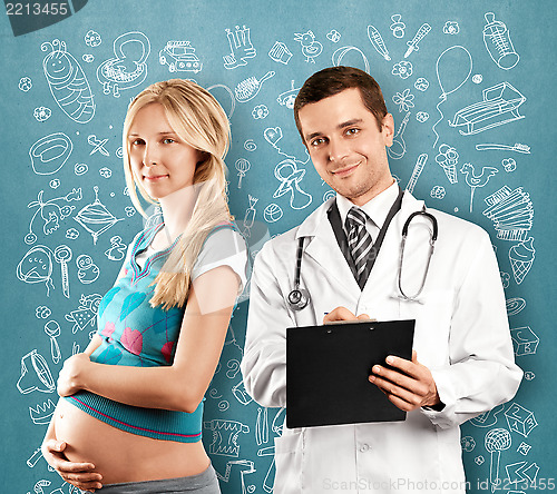 Image of Pregnant Woman With Doctor