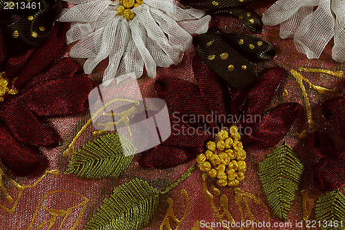 Image of The red and white embroidered flowers