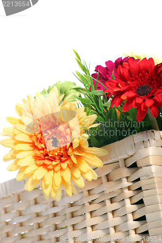 Image of Colourful Gerbera daisies in a basket