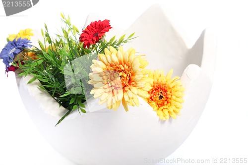 Image of large egg decorated with flowers