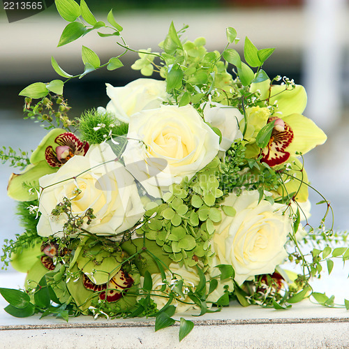 Image of Beautiful bouquet of roses and orchids