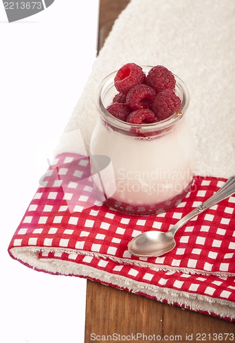 Image of Glass of fresh delicious yogurt with berry fruits