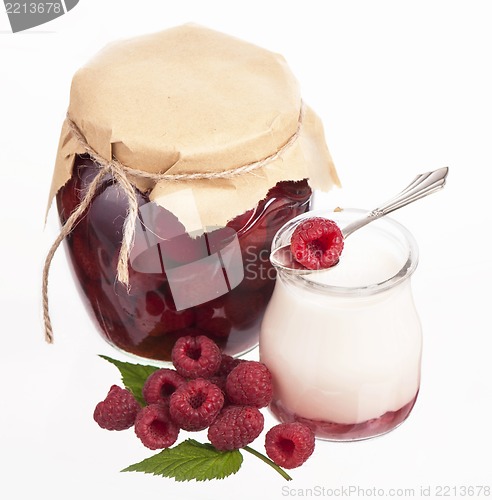 Image of Glass of fresh delicious yogurt with berry fruits