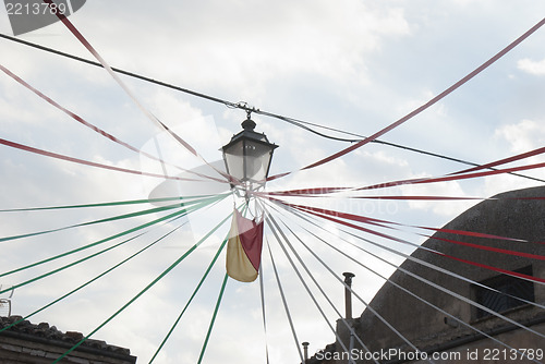 Image of Sicilian flag and street lamp