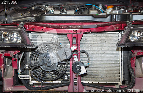 Image of Passenger car with the cover off the radiator