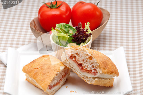 Image of ciabatta panini sandwich with parma ham and tomato