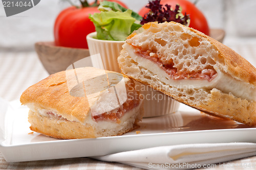 Image of ciabatta panini sandwich with parma ham and tomato