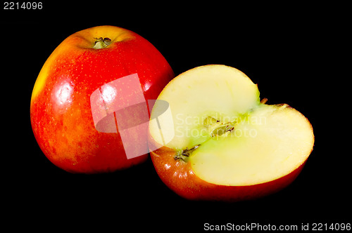 Image of sliced apples on black background