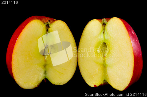 Image of sliced apples on black background