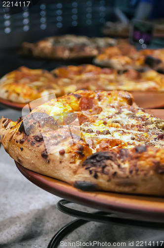 Image of Supreme meat works Pizza  sliced and ready to eat