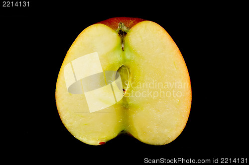 Image of sliced apples on black background