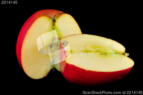 Image of sliced apples on black background