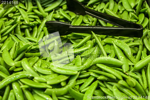 Image of Freshly harvested peas on display at the farmers market