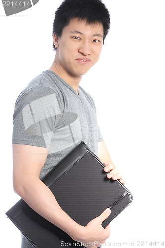 Image of Young Asian Man Holding a Black Binder