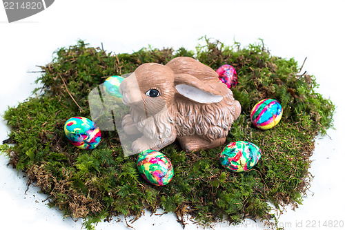 Image of Easter Decoration: Painted Eggs and Rabbit on Moss