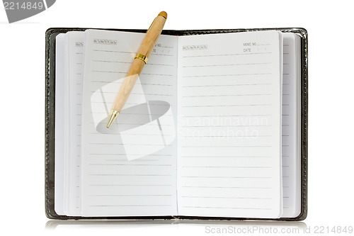 Image of Notebook and pen with reflection on white background