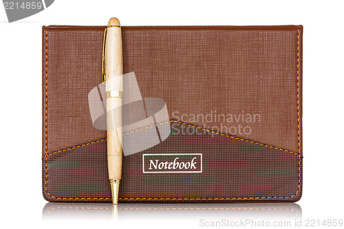 Image of Brown notebook and pen