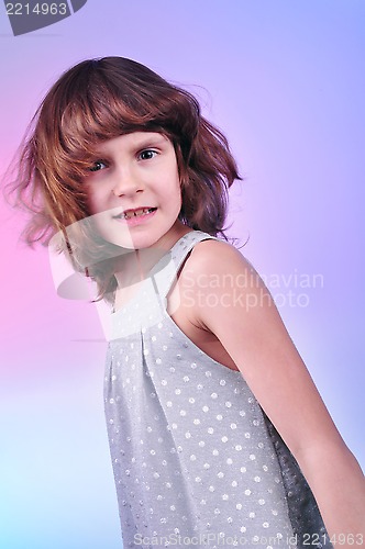 Image of  pretty 8 year old girl in silver dress