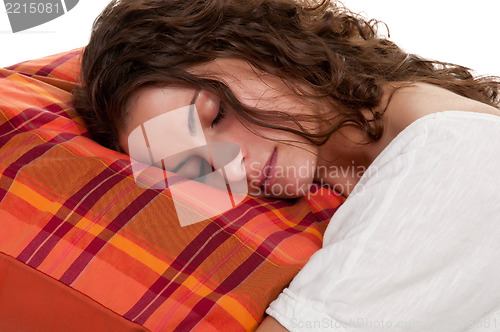 Image of Woman Sleeping in a Red Pillow