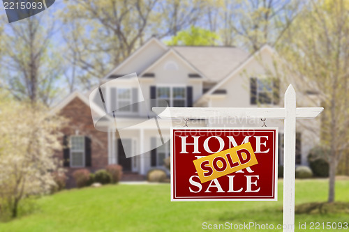 Image of Sold Home For Sale Real Estate Sign and House