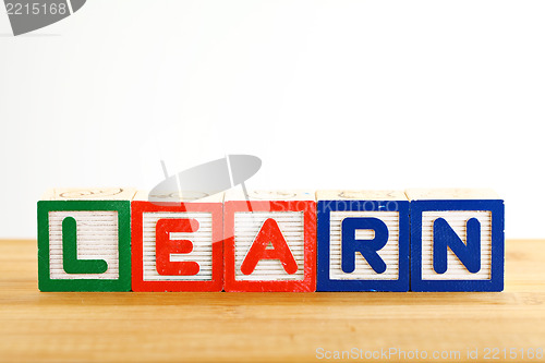 Image of Alphabet Block spell the word learn