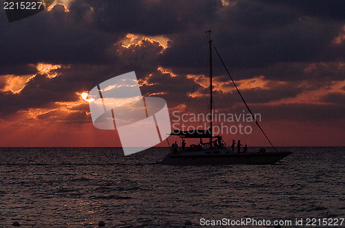 Image of sailing boat sunset red and relax