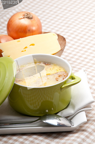 Image of onion soup with melted cheese and bread on top