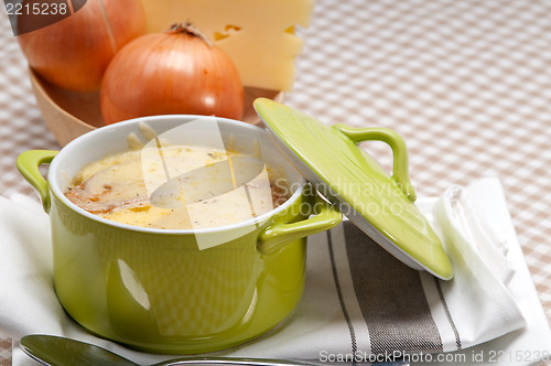 Image of onion soup with melted cheese and bread on top