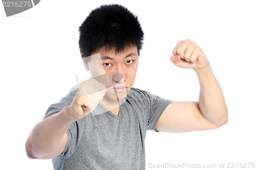 Image of Asian man fighting