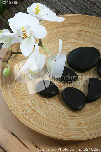 Image of Spa massage stones and orchids