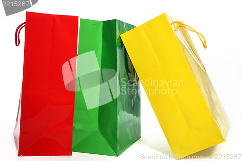 Image of Three colourful paper shopping bags