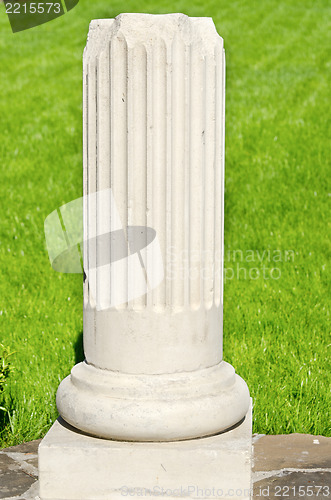 Image of bottom of white ionic column