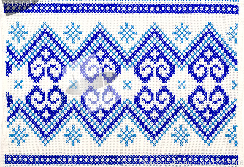 Image of embroidered good by cross-stitch pattern