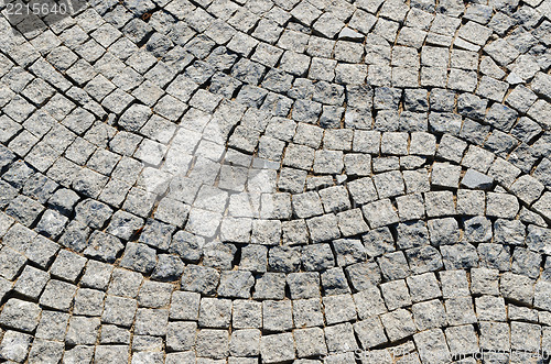 Image of cobbled road as background